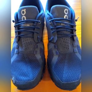 On navy blue running shoe size 8